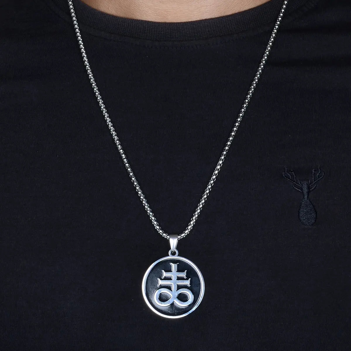 Black pendant for men with silver necklace on a black shirt by black pendant for men 