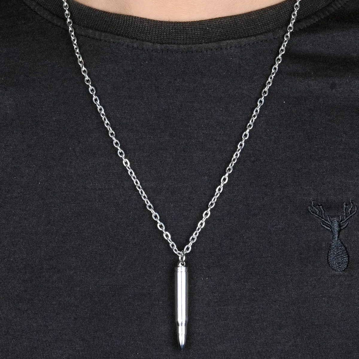 Steel bullet pendant necklace for men on a black shirt by Supreme Stud